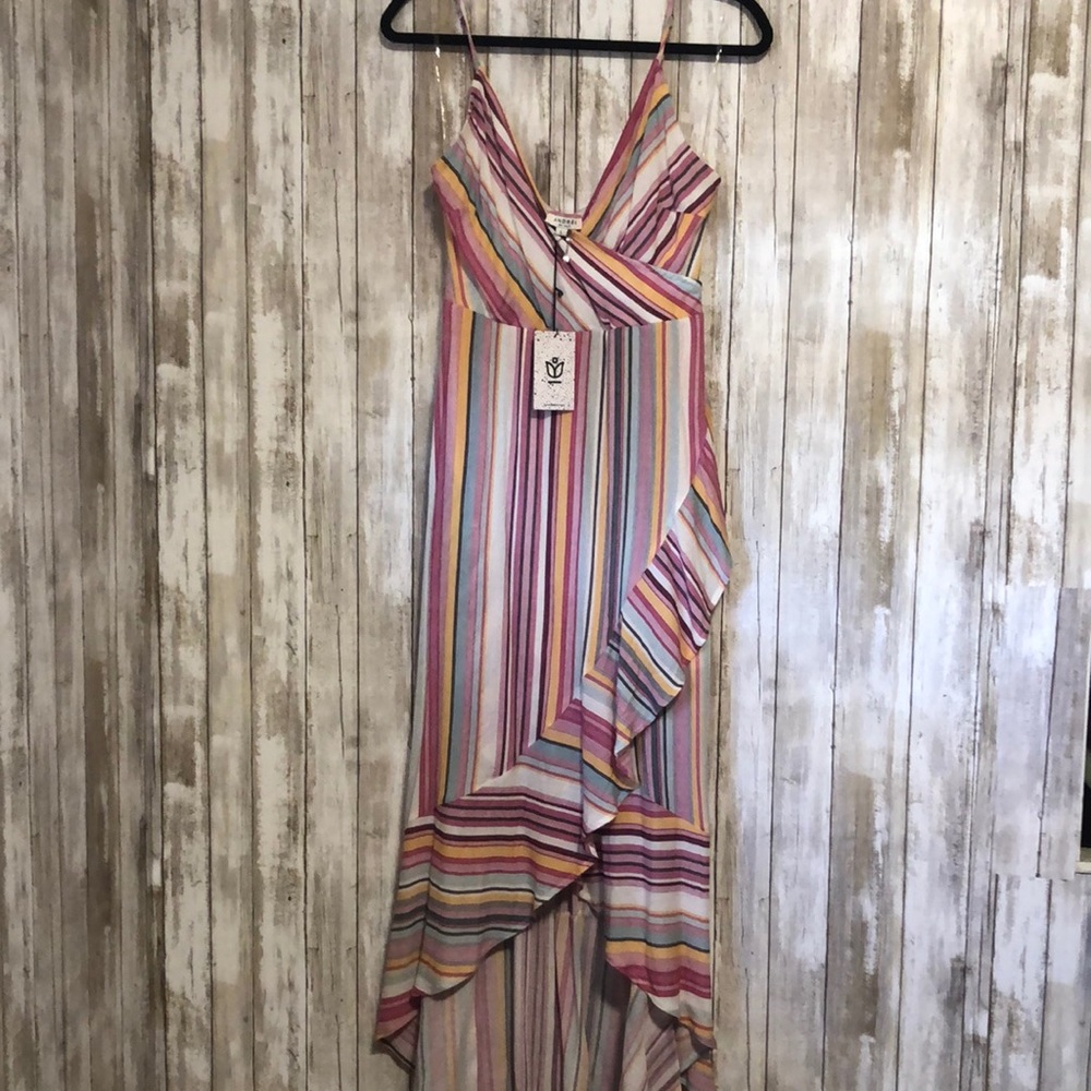 Brand new with tags never worn size large dress with belt high low design